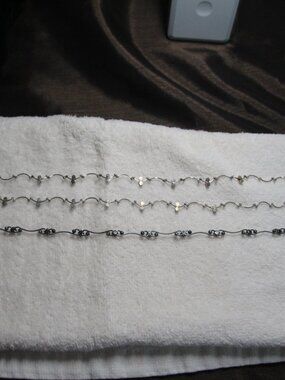 Anklets 3 for 1 price silver tone with crystals. Size 9". Good condition.